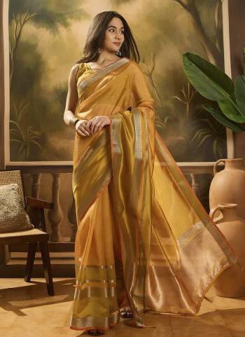 Garb These Party Wear Saree in Fine Colored.These Saree And Blouse Is Orange Fabricated.Its Beautified With Wevon Designer.