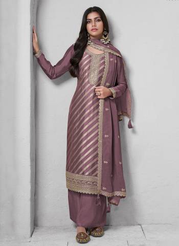  Looking These Party Wear Suit in Fine Colored Pair With Bottom And Dupatta.These Top Are Lotus Silk Jacquard And Dupatta Are Fabricated On Rangoli Georgette Pair With Santoon Bottom.Its Beautified With Wevon Jacquard Designer, Embroidery Work.