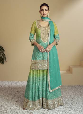 Garb These Party Wear Plazzo Suit in Fine Colored Pair With Bottom And Dupatta.These Top Are Chinon And Dupatta Are Fabricated On Chinon Pair With Chinon Bottom.Its Beautified With Digital Bandhani Printed, Embroidery,Hand Work.