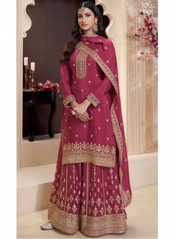  Looking These Party Wear Sharara Suit in Fine Colored Pair With Bottom And Dupatta.These Top Are Chinon And Dupatta Are Fabricated On Chinon Pair With Chinon Bottom.Its Beautified With Heavy Designer Embroidery Work.