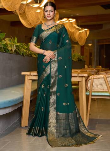 Attractive This Party Wear Saree Paired With Blouse.This Saree And Blouse Are Chinon Based Fabric With Wevon Jacquard Jari Designer. Buy This Pretty Saree Now.