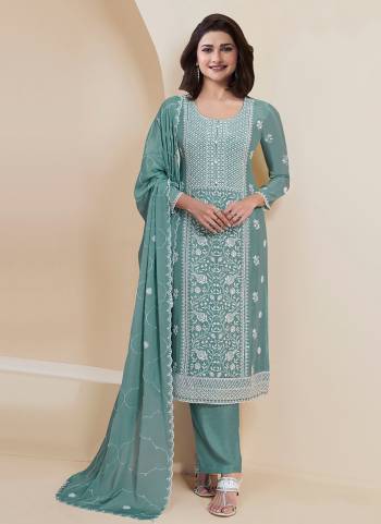 Garb These Designer Suit in Fine Colored Pair With Bottom And Dupatta.These Top Are Faux Georgette And Dupatta Are Fabricated On Faux Georgette Pair With Santoon Bottom.Its Beautified With Santoon Inner.Its Beautified With Designer Embroidery Work.
