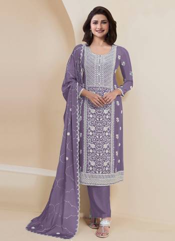 Garb These Designer Suit in Fine Colored Pair With Bottom And Dupatta.These Top Are Faux Georgette And Dupatta Are Fabricated On Faux Georgette Pair With Santoon Bottom.Its Beautified With Santoon Inner.Its Beautified With Designer Embroidery Work.