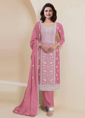 Garb These Designer Suit in Fine Colored Pair With Bottom And Dupatta.These Top Are Faux Georgette And Dupatta Are Fabricated On Faux Georgette Pair With Santoon Bottom.Its Beautified With Santoon Inner.Its Beautified With Designer Embroidery Work.
