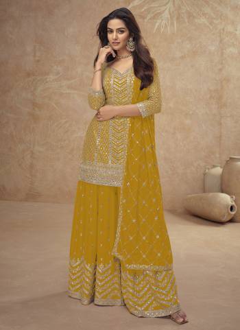 Attrective Looking These Plazzo Suit in Fine Colored Pair With Bottom And Dupatta.These Top And Dupatta Are Fabricated On Chinon Pair With Chinon Bottom.Its Beautified With Heavy Designer Embroidery Work.