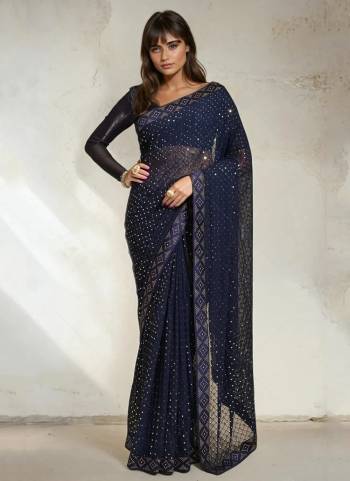 Garb These Party Wear Saree in Fine Colored.These Saree Are Georgette And Blouse is Banglori Fabricated.Its Beautified With Designer Sequance Chokdi Embroidery Work.