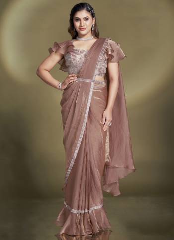 Look Attrective These Designer Party Wear Ready To Wear Saree With Blouse in Fine Colored.These Saree Are Two Tone Satin Silk And Blouse Crepe is Fabricated.Its Beautified Solid,Desiger Sequance,Beads,Aari Hand Work And Belt.