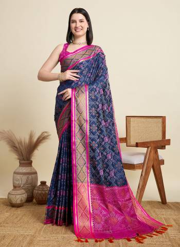 Garb This Party Wear Saree Paired With Blouse.This Saree And Blouse Are Patola Silk Fabric With Wevon Meenakari Designer. Buy This Pretty Saree Now.