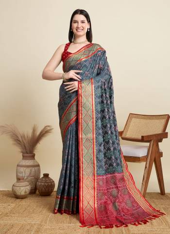 Garb This Party Wear Saree Paired With Blouse.This Saree And Blouse Are Patola Silk Fabric With Wevon Meenakari Designer. Buy This Pretty Saree Now.