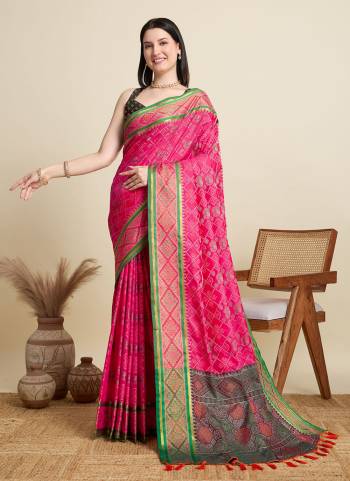 Garb This Party Wear Saree Paired With Blouse.This Saree And Blouse Are Patola Silk Fabric With Wevon Meenakari Designer. Buy This Pretty Saree Now.