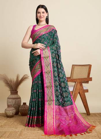 Garb This Party Wear Saree Paired With Blouse.This Saree And Blouse Are Patola Silk Fabric With Wevon Meenakari Designer. Buy This Pretty Saree Now.