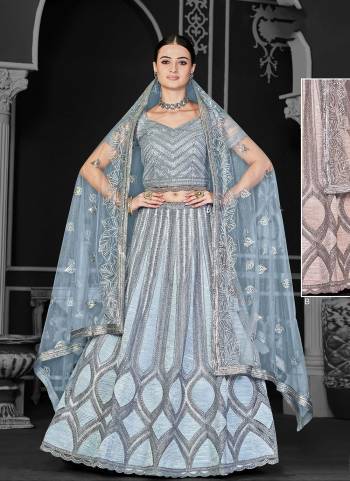 A Designer Look,Grab These  Lehenga Choli in Fine Colored.These Lehenga And Blouse Are Net And Dupatta Are Fabricated On Net.Its Beautified With Heavy Designer Embroidery Work.