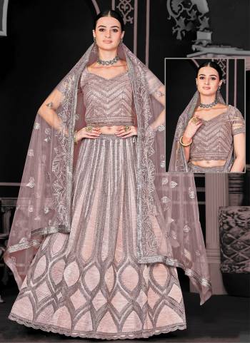 A Designer Look,Grab These  Lehenga Choli in Fine Colored.These Lehenga And Blouse Are Net And Dupatta Are Fabricated On Net.Its Beautified With Heavy Designer Embroidery Work.