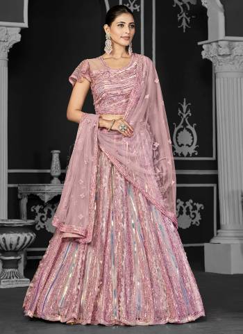 A Designer Look,Grab These  Lehenga Choli in Fine Colored.These Lehenga And Blouse Are Net And Dupatta Are Fabricated On Net.Its Beautified With Heavy Designer Embroidery Work.