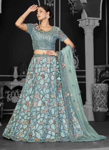 A Designer Look,Grab These  Lehenga Choli in Fine Colored.These Lehenga And Blouse Are Net And Dupatta Are Fabricated On Net.Its Beautified With Heavy Designer Embroidery Work.