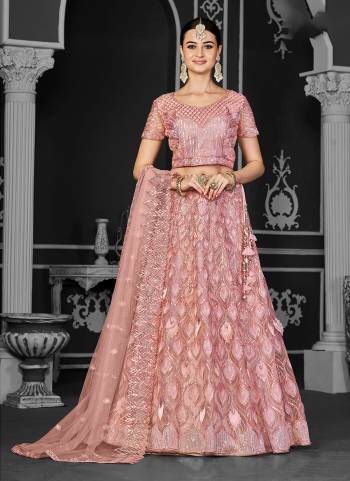 A Designer Look,Grab These  Lehenga Choli in Fine Colored.These Lehenga And Blouse Are Net And Dupatta Are Fabricated On Net.Its Beautified With Heavy Designer Embroidery Work.