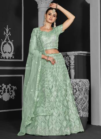 A Designer Look,Grab These  Lehenga Choli in Fine Colored.These Lehenga And Blouse Are Net And Dupatta Are Fabricated On Net.Its Beautified With Heavy Designer Embroidery Work.