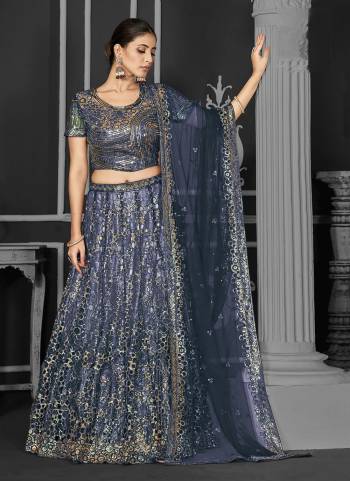 A Designer Look,Grab These  Lehenga Choli in Fine Colored.These Lehenga And Blouse Are Net And Dupatta Are Fabricated On Net.Its Beautified With Heavy Designer Embroidery Work.