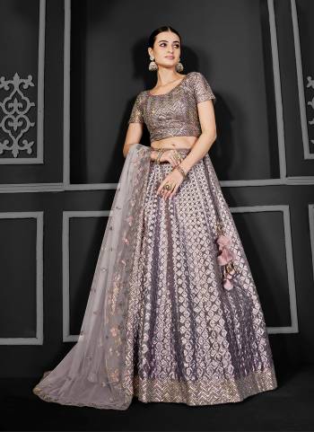 A Designer Look,Grab These  Lehenga Choli in Fine Colored.These Lehenga And Blouse Are Net And Dupatta Are Fabricated On Net.Its Beautified With Heavy Designer Embroidery Work.