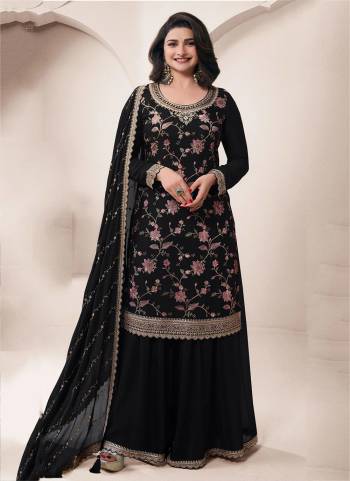  Looking These Party Wear Sharara Suit in Fine Colored Pair With Bottom And Dupatta.These Top Are Chinon And Dupatta Are Fabricated On Chinon Pair With Chinon Bottom.Its Beautified With Designer Embroidery With Hand Work.