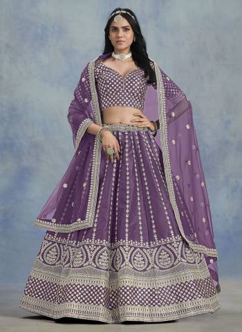 For A Designer Look,Grab These Lehenga Choli in Fine Colored.These Lehenga And Blouse Are Fabricated On Art Silk Pair With Net Dupatta.Its Beautified With Designer Embroidery Work.