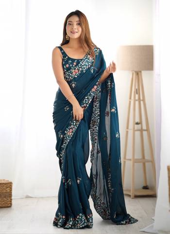 Attrective These Party Wear Saree in Fine Colored.These Saree Are Satin Chiffon And Blouse is Satin Chiffon Fabricated.Its Beautified With Designer Multy Thread,Sequance Embroidery Work.
