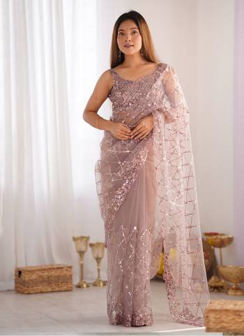 Garb These Party Wear Saree in Fine Colored.These Saree Are Soft Net And Blouse is Soft Net Fabricated.Its Beautified With Designer Sequance Embroidery Work.