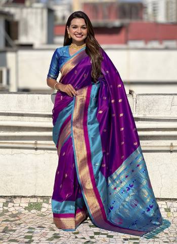 Garb These Party Wear Saree in Fine Colored.These Saree And Blouse is Fabricated On Paithani Silk.Its Beautified With Weaving Gold Jari Peacock Designer.