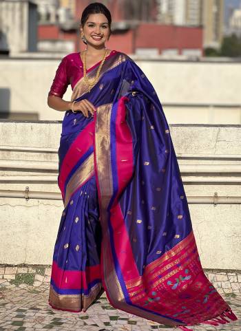 Garb These Party Wear Saree in Fine Colored.These Saree And Blouse is Fabricated On Paithani Silk.Its Beautified With Weaving Gold Jari Peacock Designer.