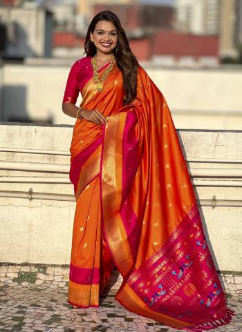Garb These Party Wear Saree in Fine Colored.These Saree And Blouse is Fabricated On Paithani Silk.Its Beautified With Weaving Gold Jari Peacock Designer.