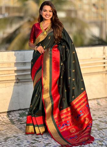 Garb These Party Wear Saree in Fine Colored.These Saree And Blouse is Fabricated On Paithani Silk.Its Beautified With Weaving Gold Jari Peacock Designer.
