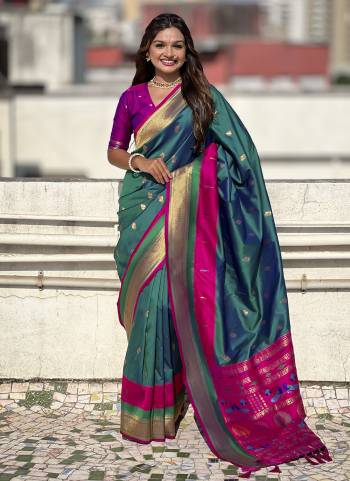 Garb These Party Wear Saree in Fine Colored.These Saree And Blouse is Fabricated On Paithani Silk.Its Beautified With Weaving Gold Jari Peacock Designer.