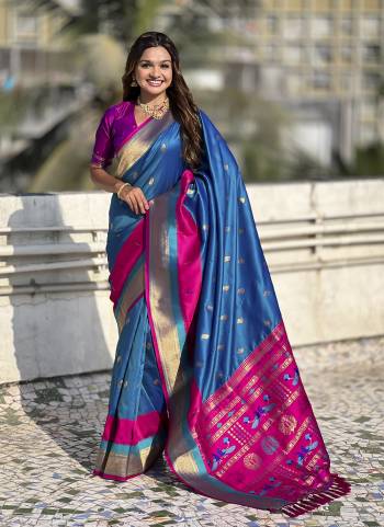 Garb These Party Wear Saree in Fine Colored.These Saree And Blouse is Fabricated On Paithani Silk.Its Beautified With Weaving Gold Jari Peacock Designer.