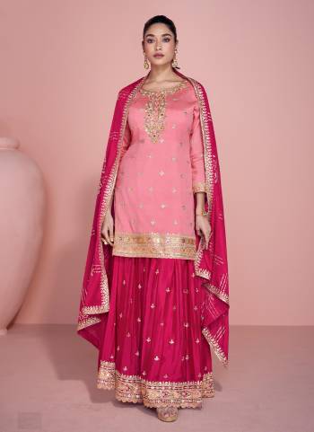 Pink Colored Palazo Suit is prettified with Embroidery work,Zari And Sequence Work as shown which makes it appear classy. This top is made of Chinon fabric which is accompanied with Chinon Bottom,Santoon Inner and Chinon dupatta. Women can buy this suit to wear for their parties and functions.