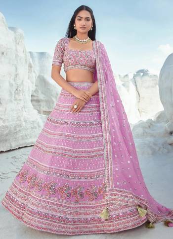For A Designer Look,Grab These Lehenga Choli in Fine Colored.These Lehenga And Choli Are Fabricated On Georgette Pair With Organza Dupatta.Its Beautified With Designer Thread,Sequance Embroidery Work.