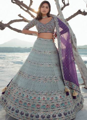 For A Designer Look,Grab These Lehenga Choli in Fine Colored.These Lehenga And Choli Are Fabricated On Georgette Pair With Organza Dupatta.Its Beautified With Designer Thread,Sequance Embroidery Work.