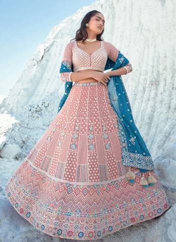 For A Designer Look,Grab These Lehenga Choli in Fine Colored.These Lehenga And Choli Are Fabricated On Georgette Pair With Organza Dupatta.Its Beautified With Designer Thread,Sequance Embroidery Work.