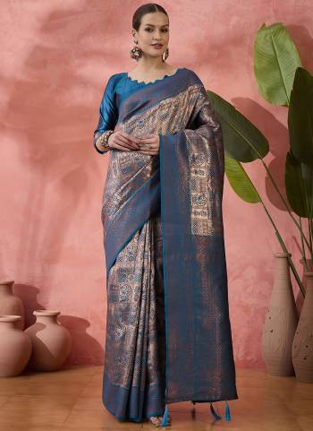 Garb These Party Wear Saree in Fine Colored.These Saree And Blouse Is Ply Silk Fabricated.Its Beautified With Wevon Jari Designer.