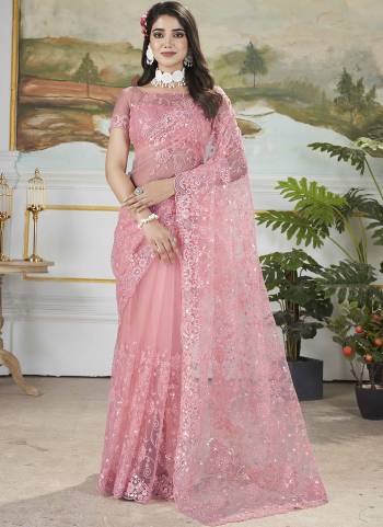 Garb These Party Wear Saree in Fine Colored.These Saree Are Butterfly Net And Blouse is Butterfly Net Fabricated.Its Beautified With Designer Duble Sequance,Thread Embroidery,Cut Work.