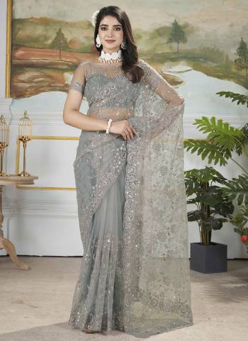 Garb These Party Wear Saree in Fine Colored.These Saree Are Butterfly Net And Blouse is Butterfly Net Fabricated.Its Beautified With Designer Duble Sequance,Thread Embroidery,Cut Work.