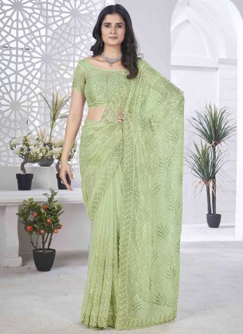 Looking These Party Wear Saree in Fine Colored.These Saree Are Tissue Net And Blouse is Tissue Net Fabricated.Its Beautified With Designer Sequance,Multy Thread Embroidery,Cut Work.