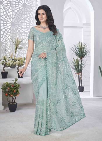 Looking These Party Wear Saree in Fine Colored.These Saree Are Tissue Net And Blouse is Tissue Net Fabricated.Its Beautified With Designer Sequance,Multy Thread Embroidery,Cut Work.