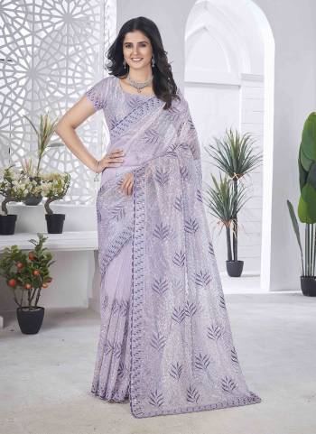 Looking These Party Wear Saree in Fine Colored.These Saree Are Tissue Net And Blouse is Tissue Net Fabricated.Its Beautified With Designer Sequance,Multy Thread Embroidery,Cut Work.