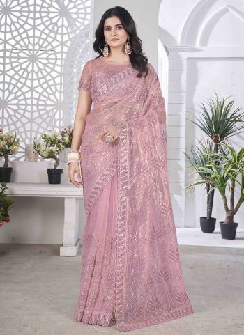 Looking These Party Wear Saree in Fine Colored.These Saree Are Tissue Net And Blouse is Tissue Net Fabricated.Its Beautified With Designer Sequance,Multy Thread Embroidery,Cut Work.