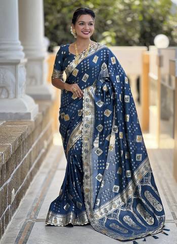 Garb These Party Wear Saree in Fine Colored.These Saree And Blouse is Fabricated On Dolla Silk.Its Beautified With Weaving Meenakari Designer.