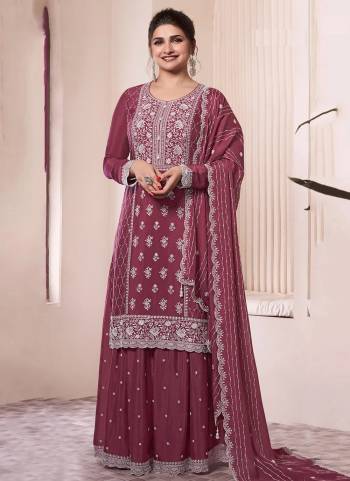 Looking These Party Wear Designer Plazzo Suits in Fine Colored Pair With Dupatta.These Top Are Chinon And Dupatta Are Fabricated On Chinon Pair With Chinon Bottom.Its Beautified With Designer Embroidery Work