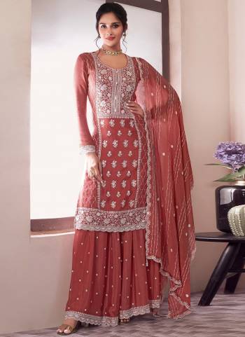 Looking These Party Wear Designer Plazzo Suits in Fine Colored Pair With Dupatta.These Top Are Chinon And Dupatta Are Fabricated On Chinon Pair With Chinon Bottom.Its Beautified With Designer Embroidery Work