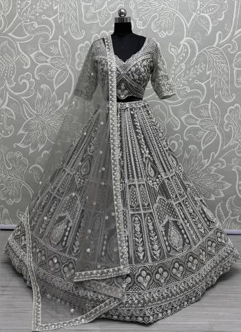 For A Fancy Designer Look,Grab These Lehenga Choli With Dupatta in Fine Colored.These Lehenga Are Net And Choli Are Net And Dupatta Are Fabricated On Soft Net Pair.Its Beautified With Heavy Designer Sequance Embroidery,Hand Work.