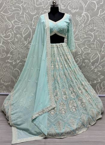 For A Fancy Designer Look,Grab These Lehenga Choli With Dupatta in Fine Colored.These Lehenga And Choli Are Georgette And Dupatta Are Fabricated On Georgette Pair.Its Beautified With Heavy Fancy Designer Sequance Embroidery,Hand Work.