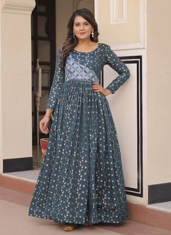 Garb These Beautiful Looking Party Wear Readymade Long Gown.These Gown is Fabricated On Jacquard.Its Beautified With Wevon Designer,Printed.